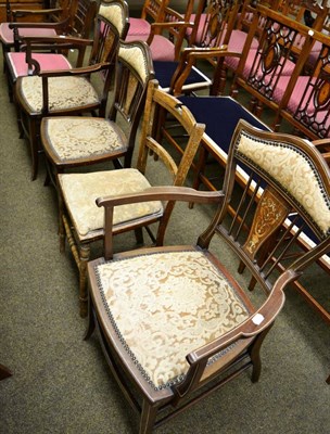 Lot 1291 - A set of three inlaid mahogany Edwardian chairs including two carvers, together with three...