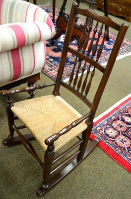 Lot 1294 - A Lancashire style rush seated rocking chair