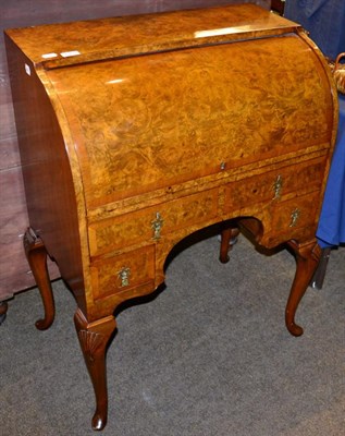 Lot 1303 - A reproduction walnut veneered cylinder bureau with fully fitted interior