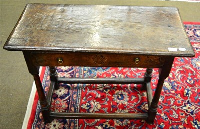 Lot 1306 - An 18th century Provincial oak side table