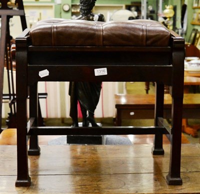 Lot 1316 - A leather seated adjustable piano stool