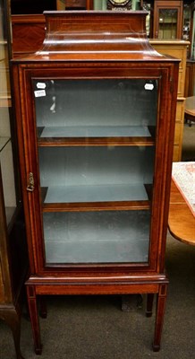 Lot 1319 - An inlaid mahogany display cabinet with caddy top