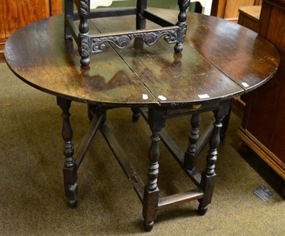 Lot 1324 - A William and Mary oak gateleg dining table, 113cm in width