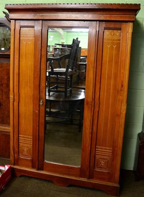 Lot 1342 - An early 20th century oak mirror fronted wardrobe