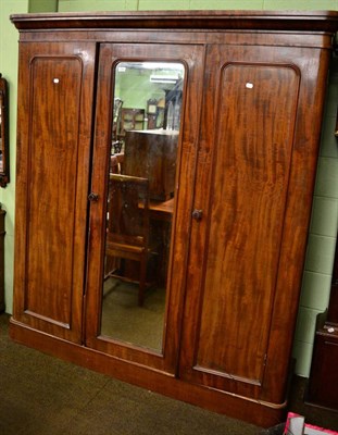 Lot 1344 - A Victorian mahogany three panel wardrobe