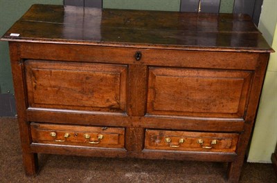 Lot 1347 - An 18th century oak mule chest