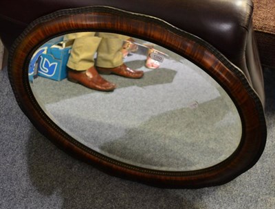 Lot 1350 - An Edwardian mahogany framed oval mirror