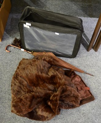 Lot 1366 - A brown fur jacket and Paragon parasol (2)