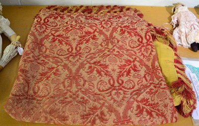 Lot 1392 - A 20th century red and cream woven brocade bed cover, with tassel fringing, and yellow silk...