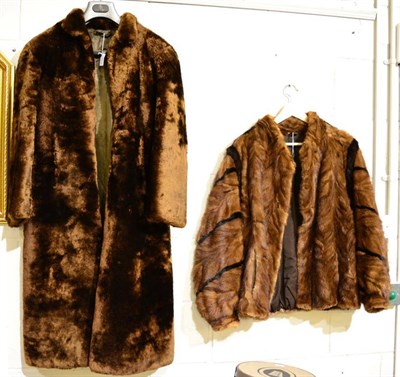 Lot 1410 - Fur jacket with dark mink trim insertions, and a long brown fur coat