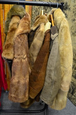 Lot 1413 - A Rodgers of Bridlington mink coat, a musquash coat by Schofield of Leeds, a short fur coat,...