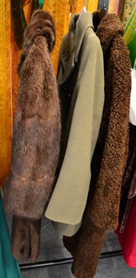 Lot 1415 - Gieves & Hawkes military wool ladies coat, Persian lamb coat and a Maurice Delody fur coat (3)