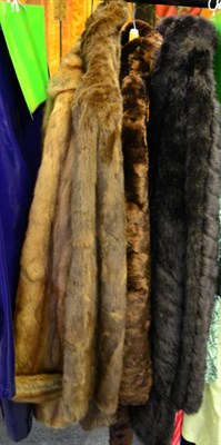 Lot 1417 - A musquash coat, dark brown faux fur jacket and two others (4)