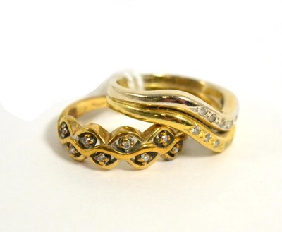 Lot 12 - A 9 carat gold ring, stamped 375, set with small stones together with another ring, stamped 750 (2)