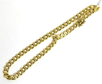 Lot 30 - A curb linked bracelet with clasp stamped 14K