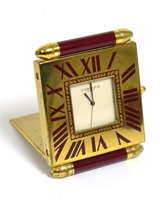 Lot 39 - A travelling alarm timepiece, signed Cartier, Paris