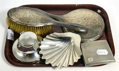 Lot 65 - A small group of silver including a capstan inkwell, a shell dish, cigarette case and two...