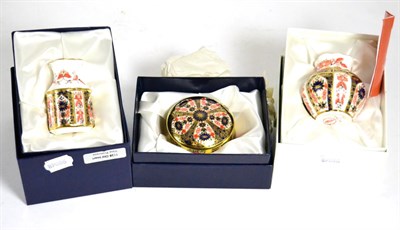 Lot 86 - Three pieces of Royal Crown Derby Imari including a circular box and two vases, boxed