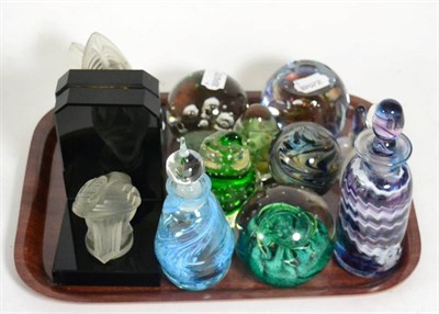 Lot 115 - A group of glass including paperweights and scent bottles including Caithness, a pair of...