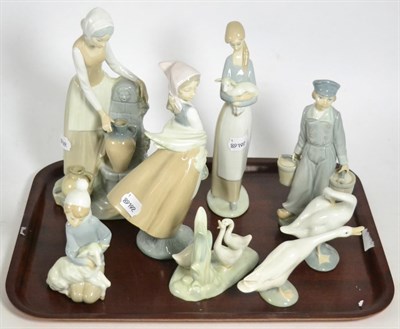 Lot 122 - Two Lladro figures, two Lladro geese and four Nao figures