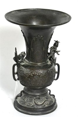 Lot 127 - An Oriental bronze Gu shaped vase, circa 1900