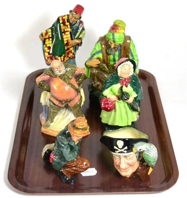 Lot 133 - A group of Royal Doulton figures comprising; The Cobbler HN1706, The Carpet Seller HN1464, Falstaff