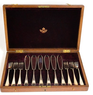 Lot 154 - Six pairs of silver fish knives and forks, Sheffield 1913, with bright cut borders, in a fitted...