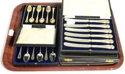 Lot 157 - A set of twelve silver handled knives, in two boxes, Sheffield 1924; two boxed sets of silver...