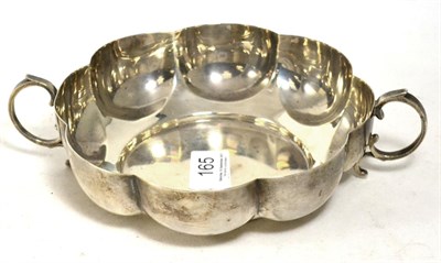 Lot 165 - An Edwardian twin handled silver bowl, Charles Stuart Harris, London 1901, of lobed form 17cm...