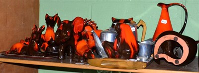 Lot 177 - A large group of Canadian pottery figures of animals; together with a piquot ware tea set and tray