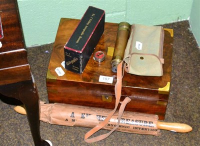 Lot 187 - Writing slope, 'Isobel' rolling pin, Brownie no.2 folding camera and a brass telescope