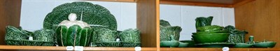 Lot 193 - Two shelves of Majolica green glazed cabbage ware