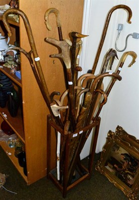 Lot 202 - A group of various walking sticks and crooks including horn handled examples