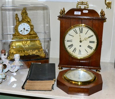 Lot 210 - A French striking gilt metal mantel clock; an oak cased table timepiece; an inlaid mahogany...