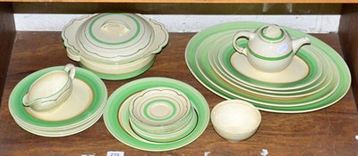 Lot 219 - An assortment of Clarice Cliff green band pattern wares, examples produced by Newport Pottery,...