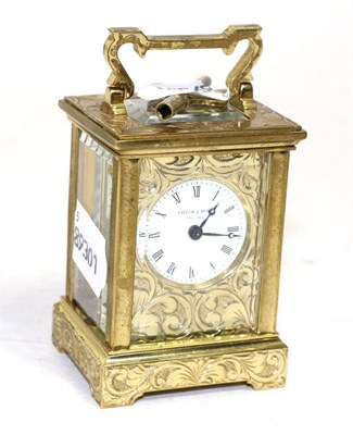 Lot 228 - A small brass carriage timepiece ltd ed 5/500, ";H M Queen Elizabeth The Queen Mother 4th...