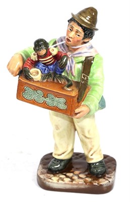 Lot 230 - A Royal Doulton figure ''The Organ Grinder'', HN2173