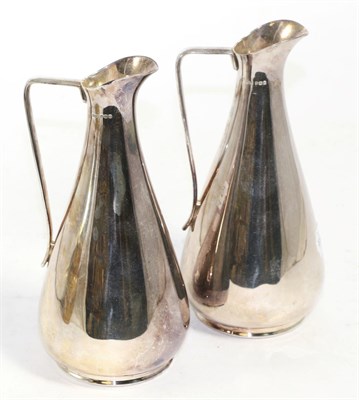 Lot 255 - A pair of silver ewers by James Dixon & Sons, Sheffield, 1969 (2)