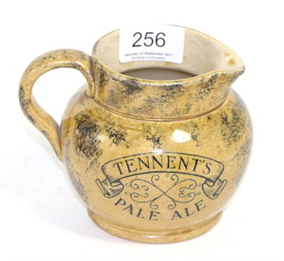 Lot 256 - A late Victorian sponge decorated Tennants pale ale advertising jug