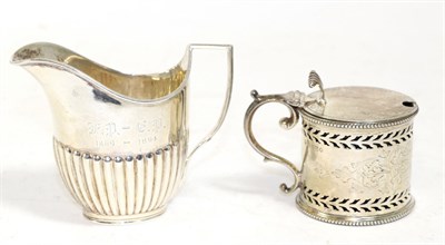 Lot 261 - A Victorian silver mustard pot, Martin Hall & Co, Sheffield 1861, with pierced borders; and a...