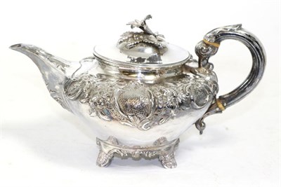 Lot 264 - A William IV silver teapot, Charles Thomas Fox, London 1836, with repousse decoration and...