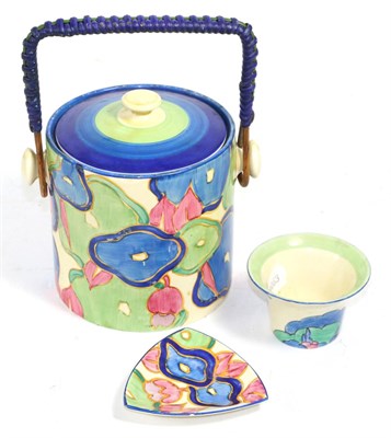 Lot 266 - A Clarice Cliff biscuit barrel and two other pieces (3)