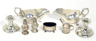 Lot 272 - A pair of silver sauce boats, London 1912; a pair of silver dwarf candleticks (a.f.); and a...