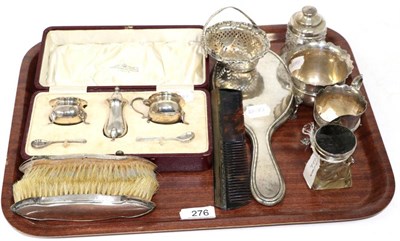 Lot 276 - A group of silver to include: a cased condiment set; cream jug and sugar bowl; pierced basket etc