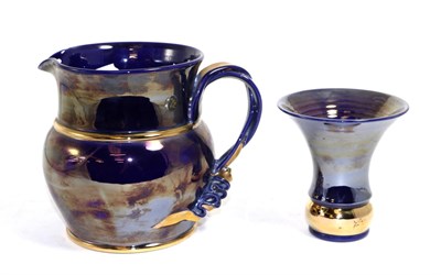 Lot 282 - Tobias Harrison iridescent blue glazed pottery jug and vase