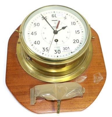 Lot 301 - A Smiths astral brass bulkhead clock