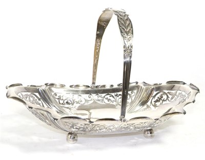 Lot 318 - A pierced silver swing handled basket