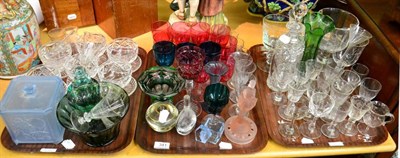 Lot 341 - Three trays of glass including cranberry and blue glass wines, etc