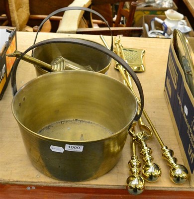 Lot 1009 - Brassware comprising roasting jack, two jam pans and a set of three fire irons