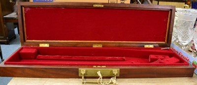 Lot 1013 - A brass bound mahogany gun case